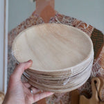 PALM LEAF PLATTERS SERVING GUESTS
